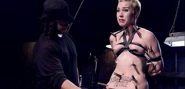  Blonde in device bondage tormented